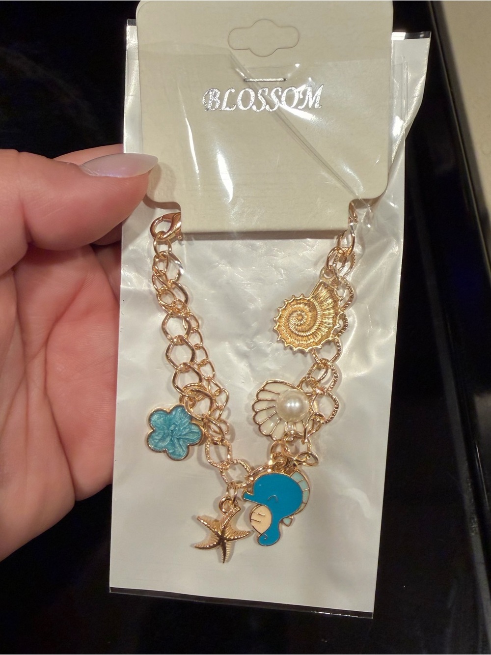 Gold-Tone Sea Charm Bracelet with Turquoise Accents